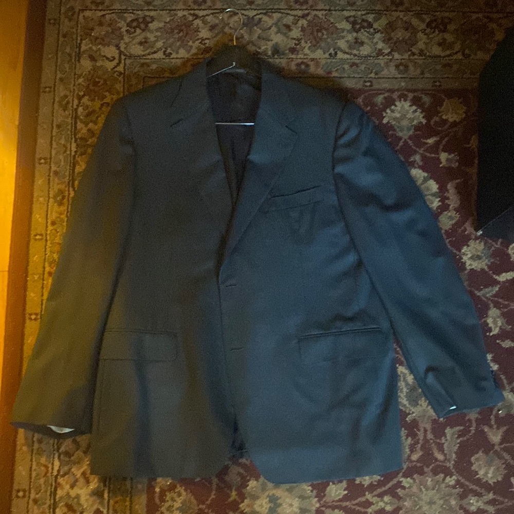 This is a black exclusive super 150s canali sports coat.